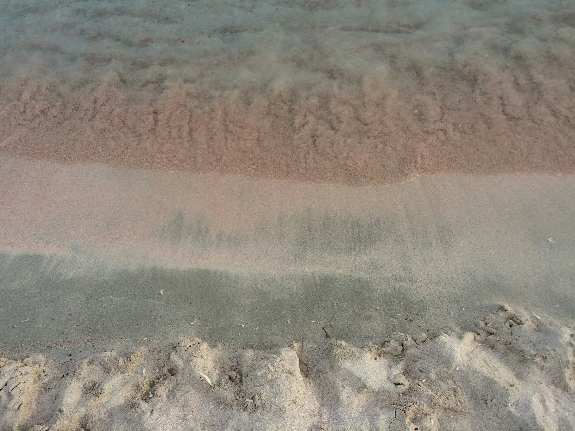 Pink sand beach with turquoise waters